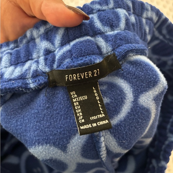 F21 Cozy Blue Sweats with Smiley Flower Pattern - Picture 3 of 3